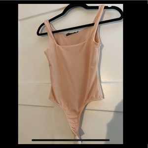 New Nude bodysuit size 6 small with tags